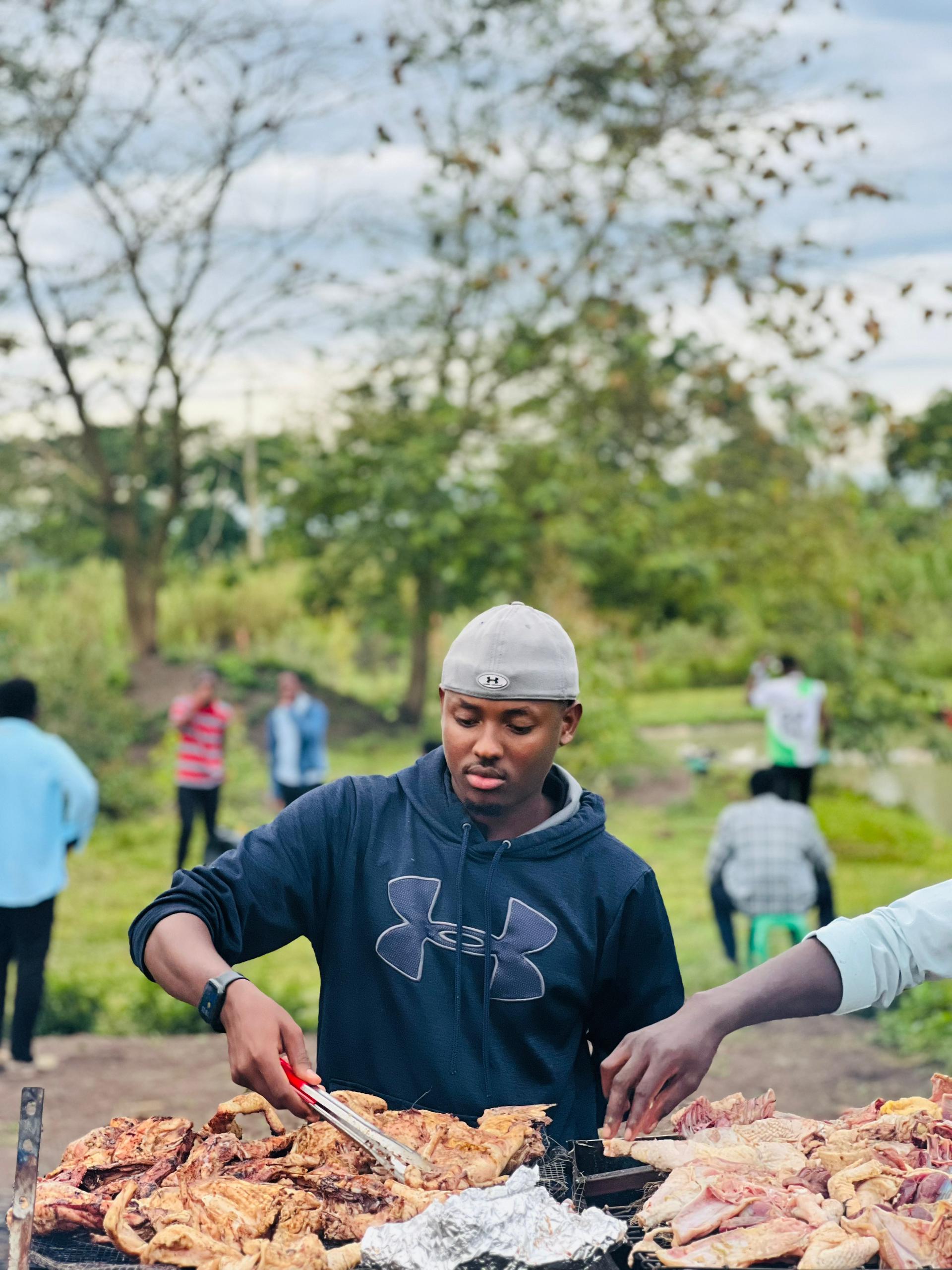 Mutambuze Gadgets Grilling At Fun Farming Uganda. Celebrity Shots